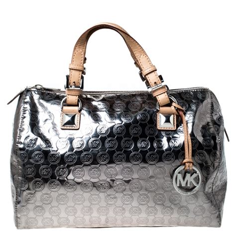 silver with braids michael kors purses|Michael Kors silver backpack.